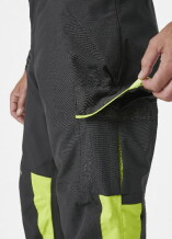 Kergesti talve kombinesoon Alna 2.0, CL1, kollane/must C50, Helly Hansen, 71490_369-C50, Helly Tech® Performance, Primaloft® Black isolatsioon, YKK® tõmblukk, eemaldatavad ja elastsed rihmad, kaks külgekotti