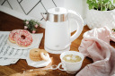 Electric kettle 800W 0.6L plastic stainless steel body 360° rotational base White AD1372 Adler