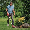 Einhell GE-CG 18/100 Li T akumuliatorinės žolės ir krūmų žirklės vejos kra&scaron;tams ir gyvatvorėms pjauti 100/200mm 18V 2.5Ah Li-ion Power X-Change 3410310 teleskopinė rankena raudona juoda
